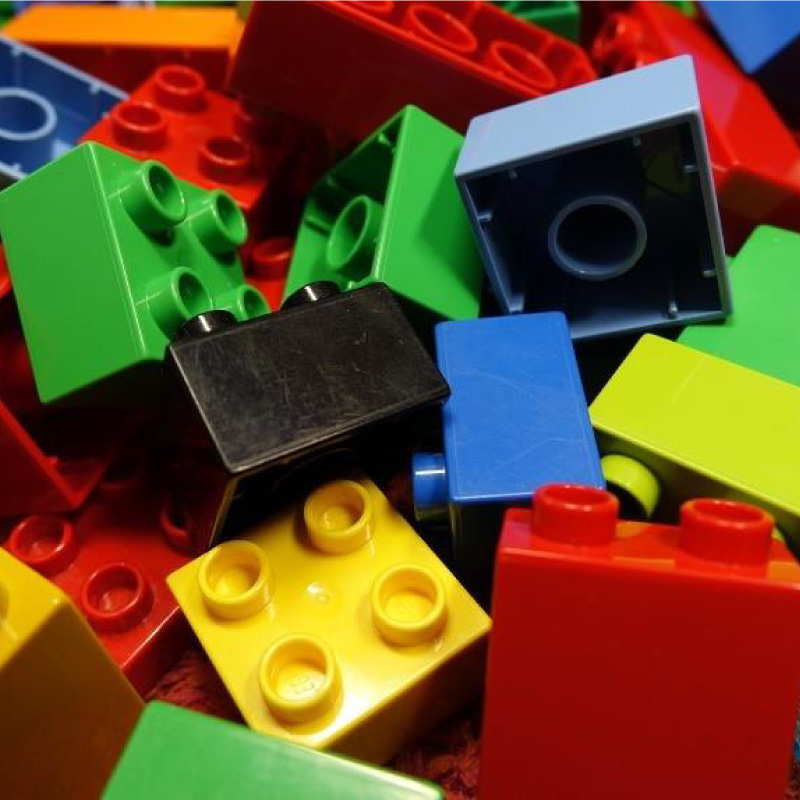 image of a variety of lego blocks piled together